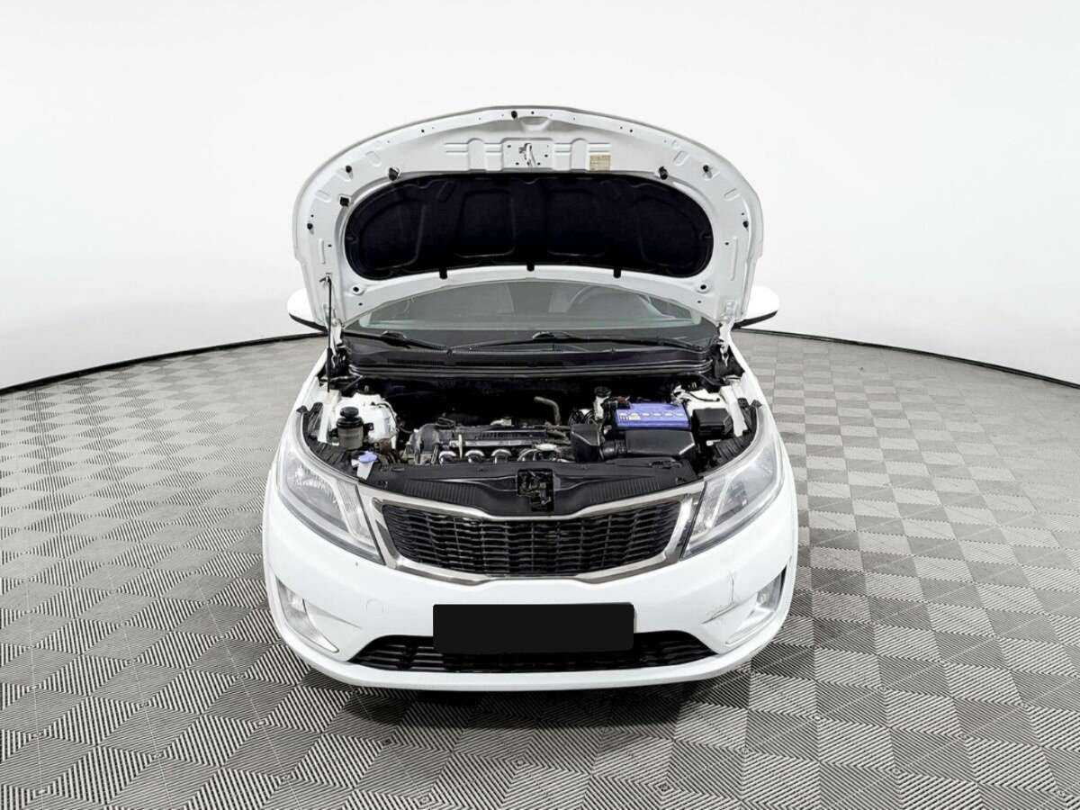 Kia Rio 5-speed, 2013 Фото №9